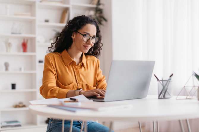 Woman visiting website on a computer